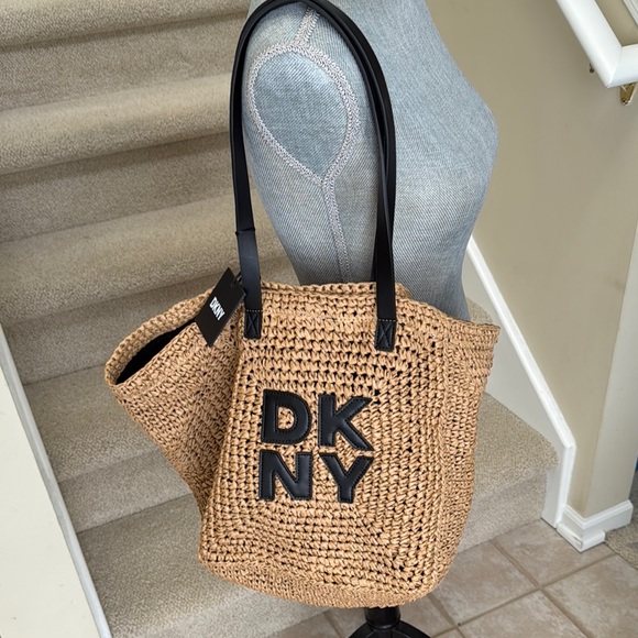 - New DKNY Paloma Tote. Nice large bag with DKNY letters on the front. - Picture 2 of 15